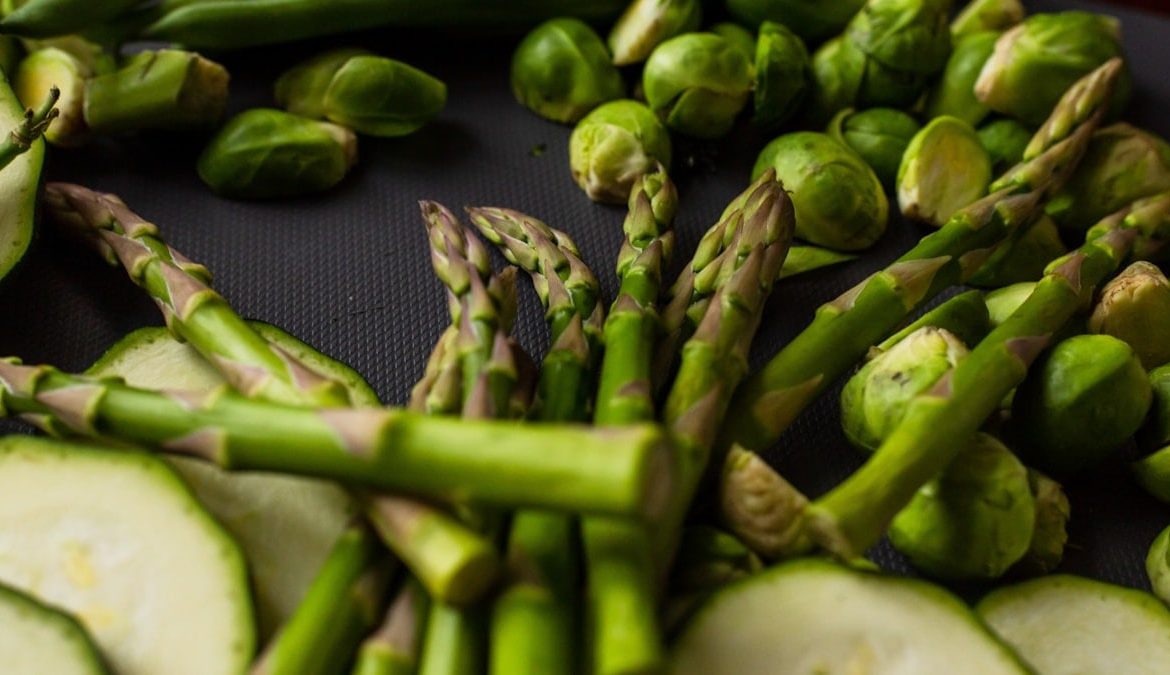 green chili on black textile